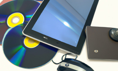 Image avec cd, tablette et disque dur externe